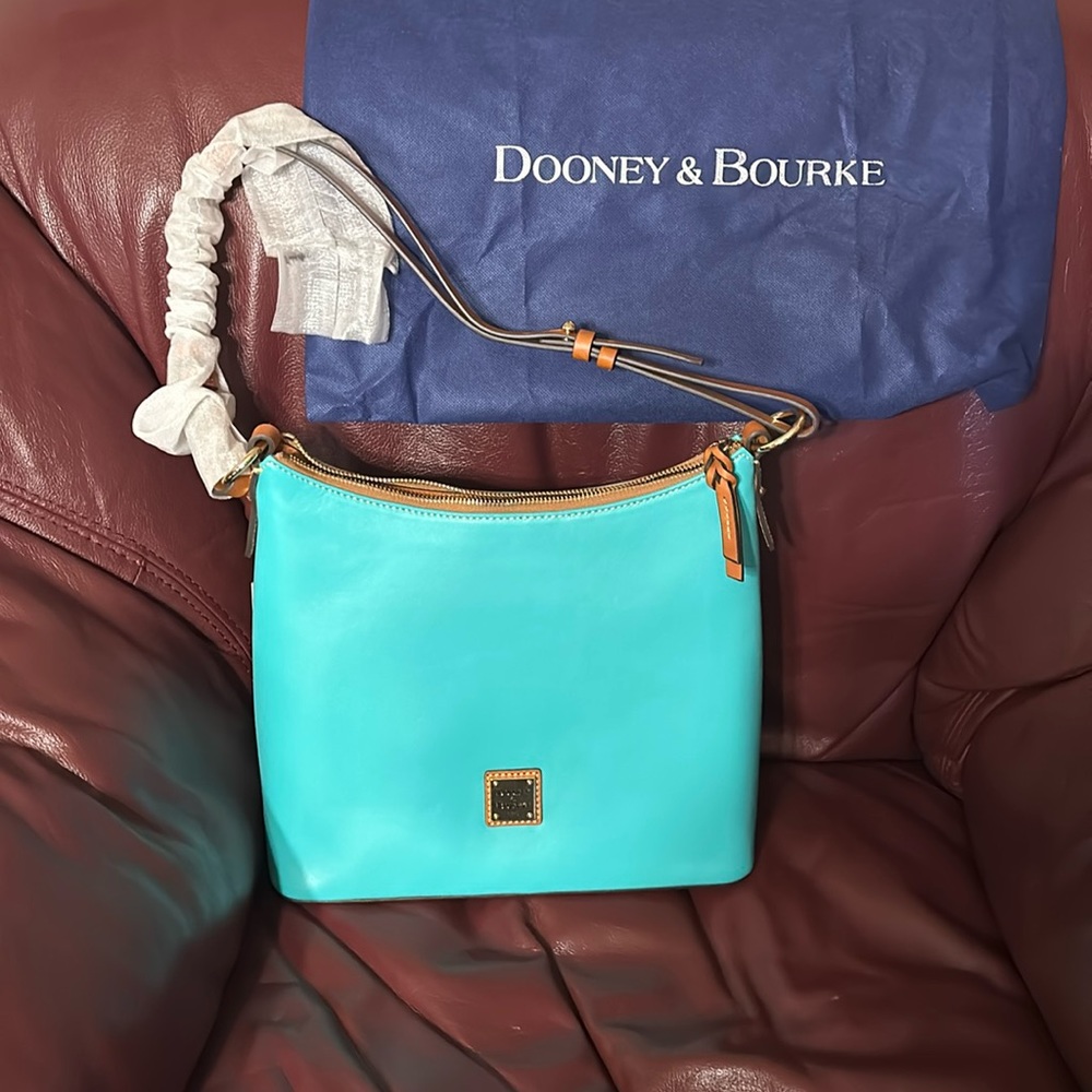 Brand new Dooney & Bourke Purse color Jade Wexford leather